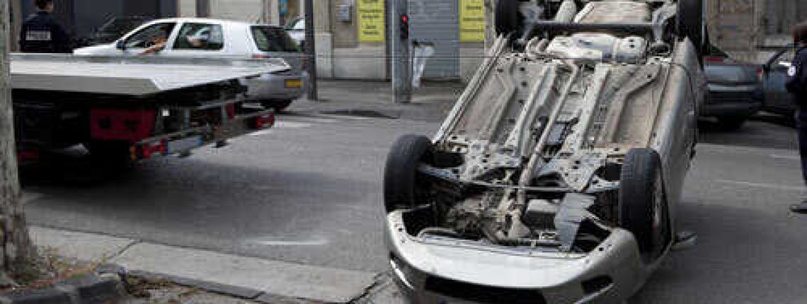 car-flipped-over-in-the-street-sm