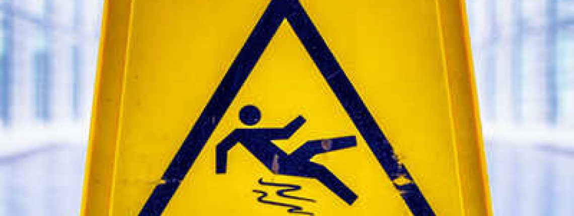 caution wet floor sign at a corridor