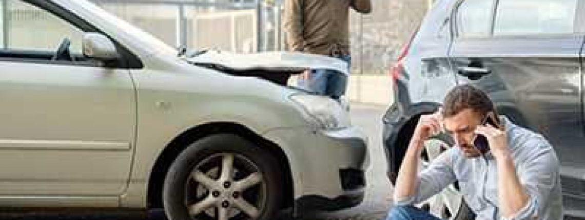 two-men-on-phone-after-rear-end-accident-sm